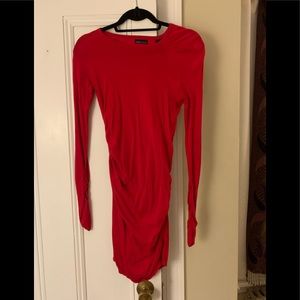 Red ruched side long sleeve sweater dress.